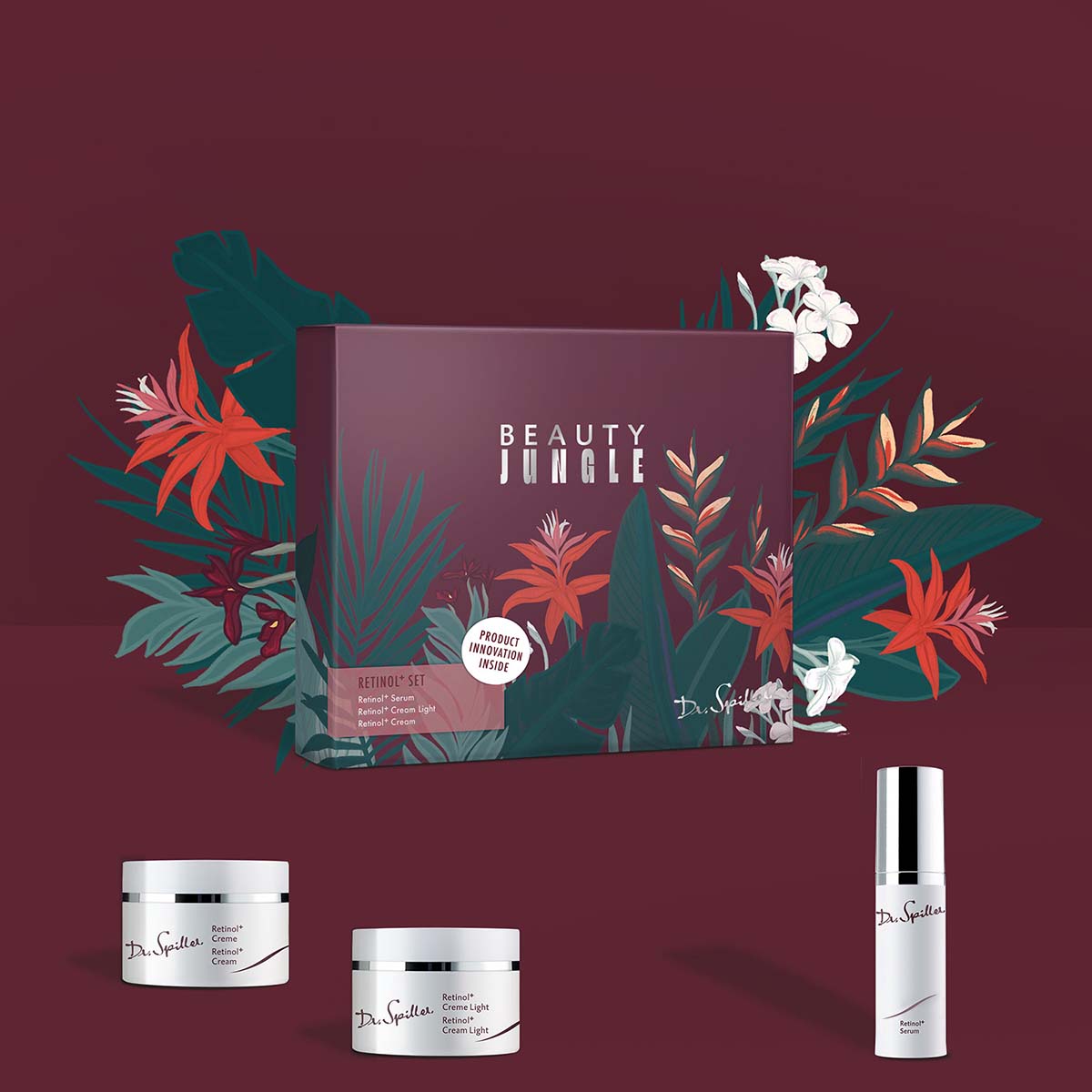 DR SPILLER Retinol Plus Set, 90ml, Geschenkbox und Produkte vor bodeauxfarbenem Hintergrund