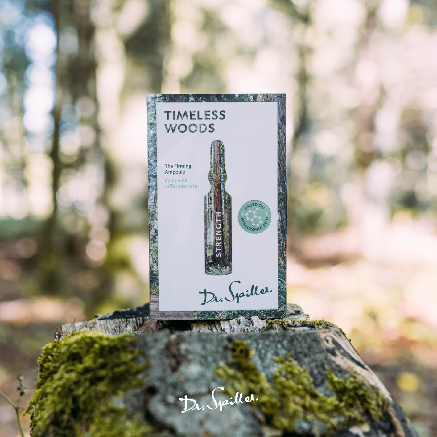 DR SPILLER Strength - Timeless Woods - The Firming Ampoule – 7x2 ml, Umverpackung auf Baumstumpf