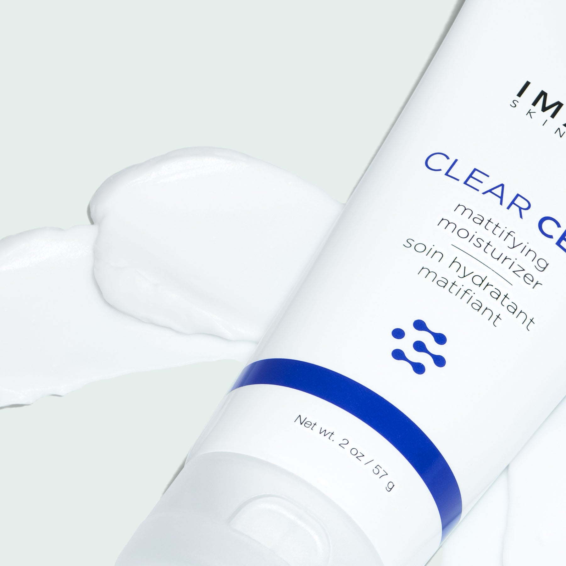 IMAGE SKINCARE CLEAR CELL Mattifying Moisturizer – Mattierender Moisturizer für unreine Haut, 57g, Tube liegend mit Cremeprobe