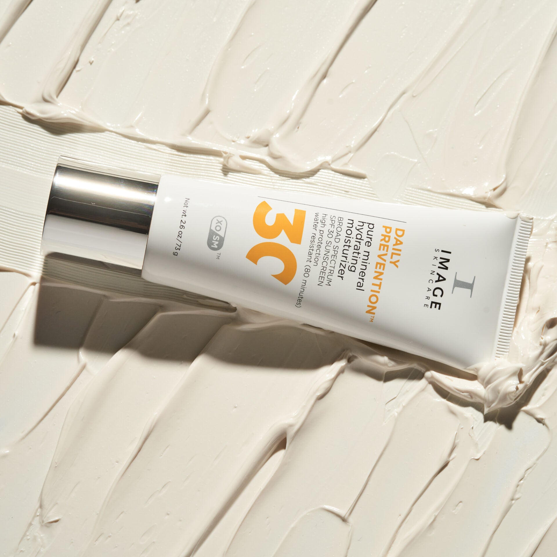 IMAGE SKINCARE pure mineral hydrating moisturizer SPF 30 – Sonnenschutz, 73g, Tube liegend auf Creme