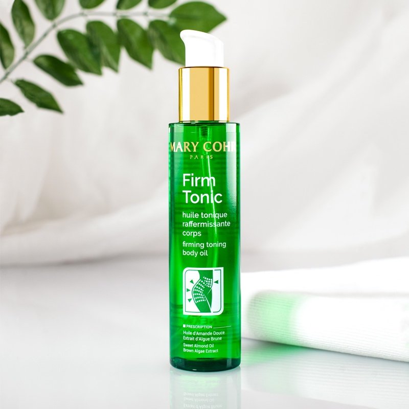 MARY COHR Firm Toning Body Oil – Straffendes Pflegeöl, 150ml, Pumpspender mit weißem Stoff und grünen Blättern
