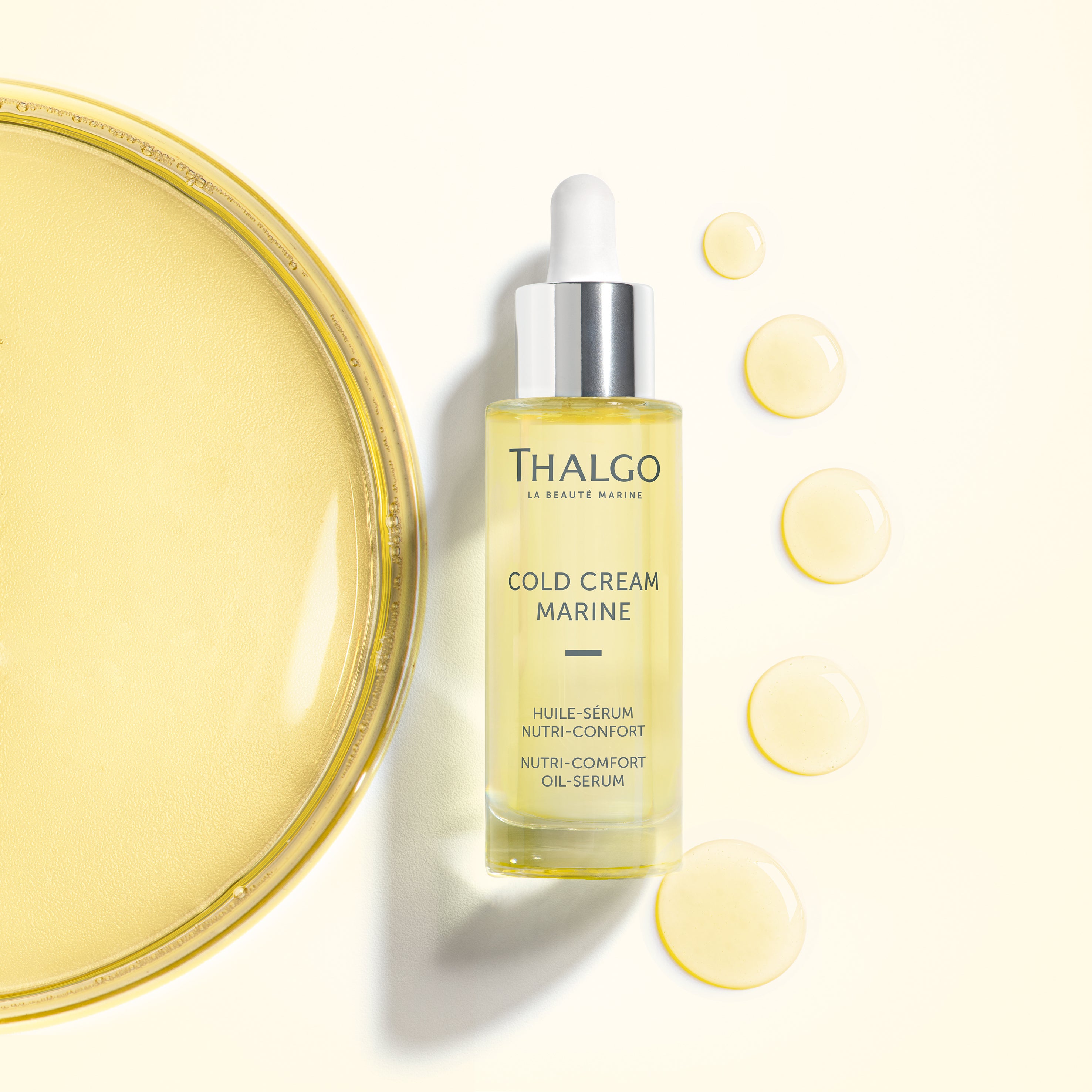 THALGO Cold Cream Marine 2.0 - Nutri-Comfort Öl-Serum  – 30ml, Spender liegend mit Produktprobe