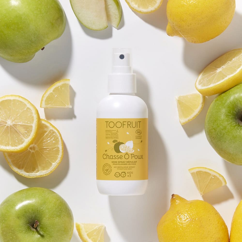 TOOFRUIT Chasse Ô Poux Anti-Läuse Spray – 125ml, Sprühflasche umringt von Zitronen und Äpfeln