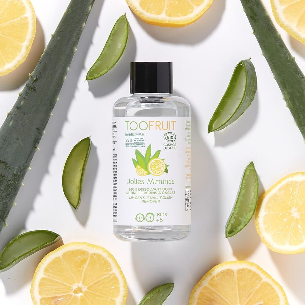 TOOFRUIT Nagellack Entferner – 100ml, Flasche umringt von Zitronenscheiben und Aloe Vera Blättern