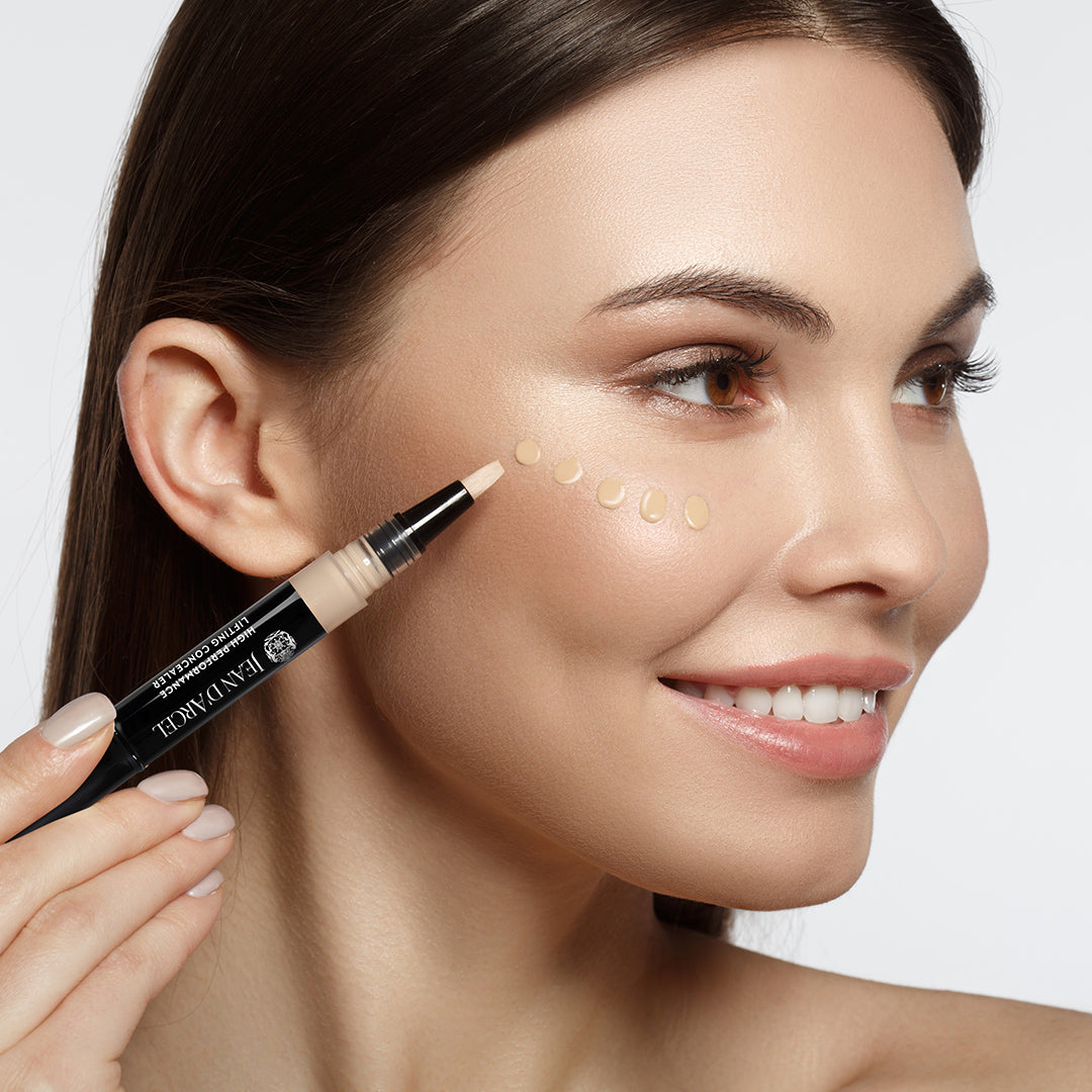 Cheerful girl applying tone cream