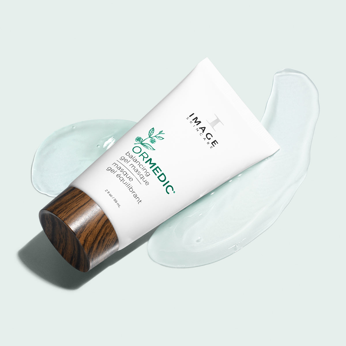 IMAGE SKINCARE Ormedic Balancing Gel Masque – Beruhigende Gelmaske, 59ml, Tube liegend mit Produktprobe