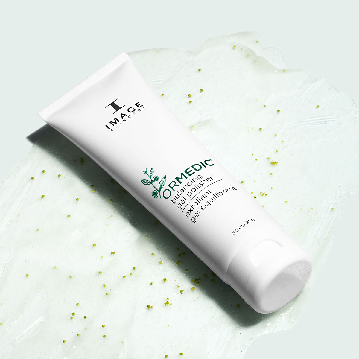 IMAGE SKINCARE Ormedic Balancing Gel Polisher – Sanftes Peeling, 91g, Tube liegend mit Produktprobe