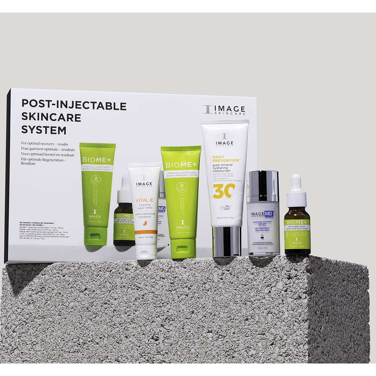 IMAGE SKINCARE Post-Injectable Skincare System – Pflege-Routine, 1stk, Produkte und Umkarton auf Stein