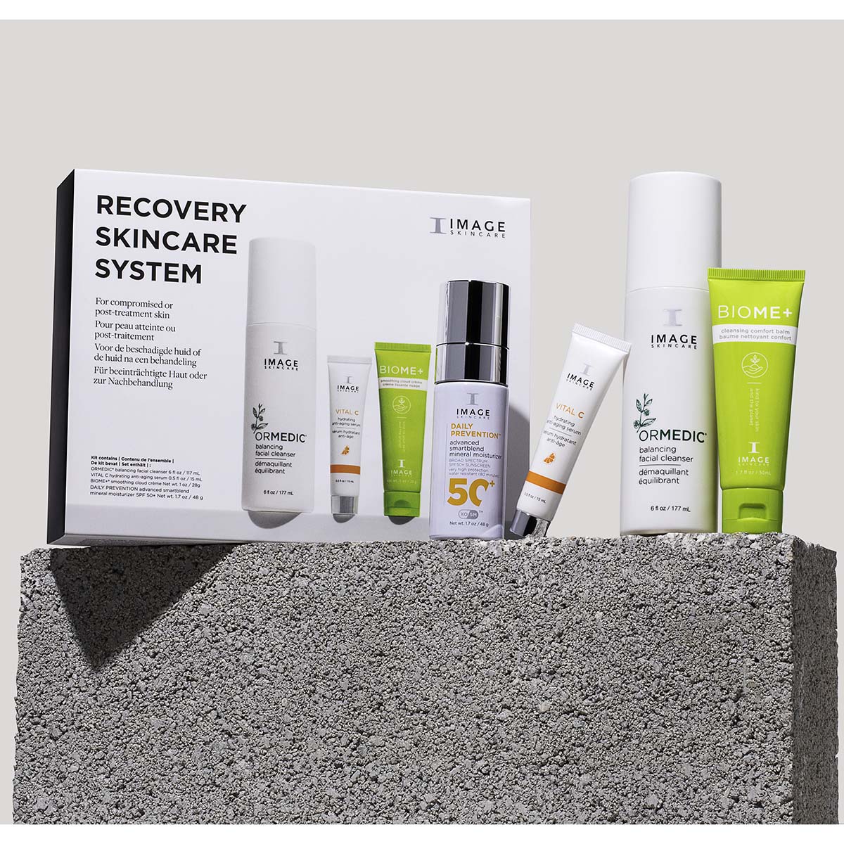 IMAGE SKINCARE Recovery Skincare System – Pflege-Routine, 1stk, Produkte und Umkarton auf Stein