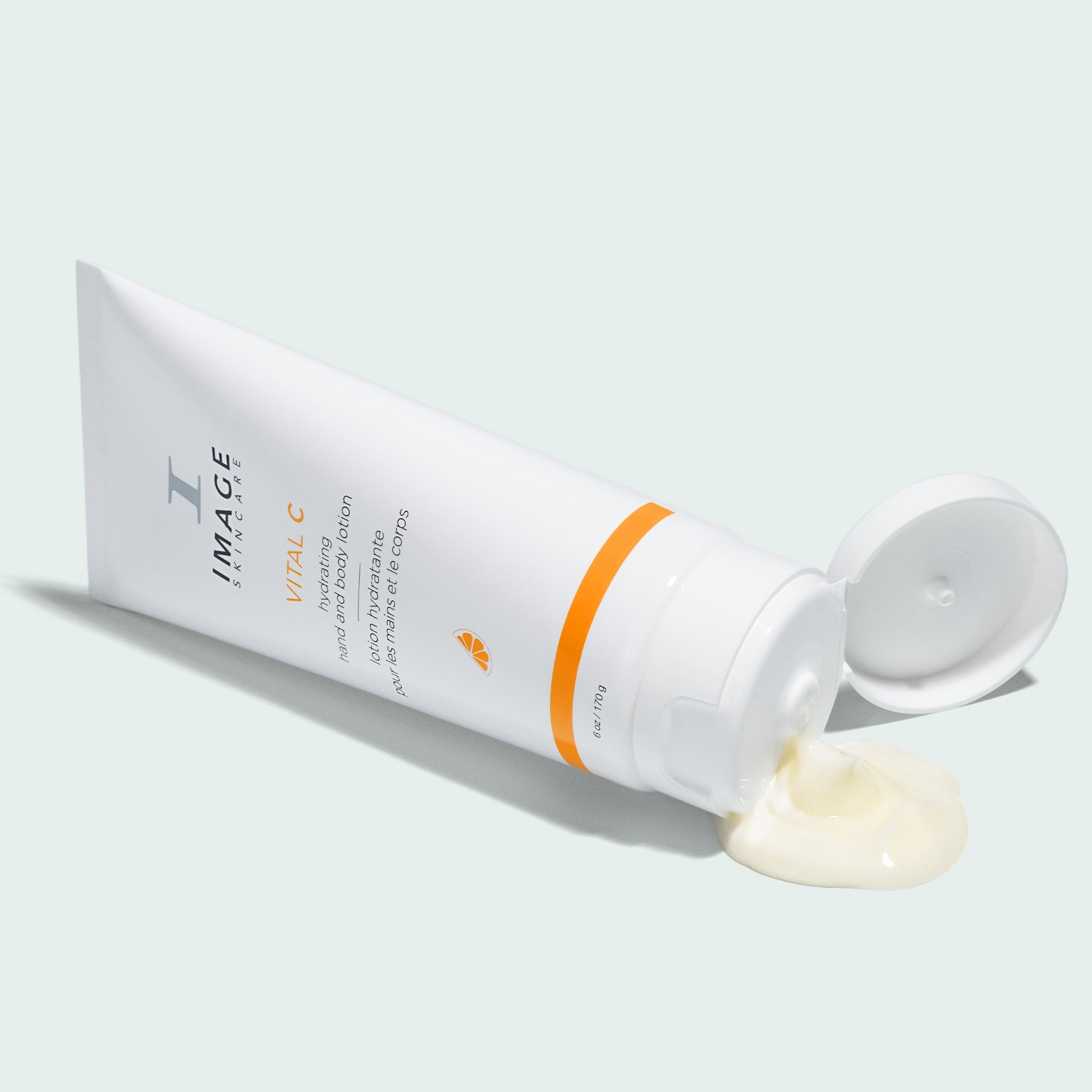 IMAGE SKINCARE Vital C Hydrating Hand & Body Lotion – Nährstoffreiche Körperpflege, 170g, Tube offen mit Produktprobe
