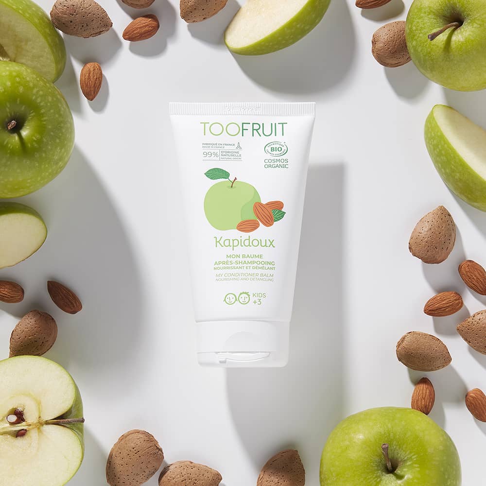TOOFRUIT Kapidoux Conditioner – Apfel - Mandel , 150ml, Tube umringt von Äpfeln und Mandeln